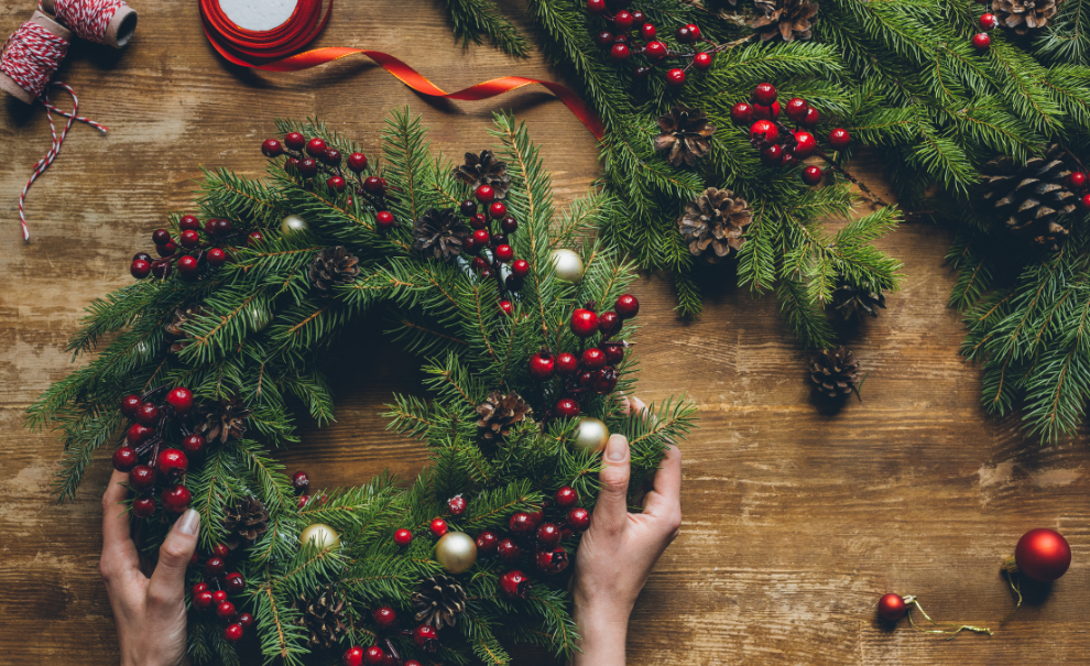 hands making wreath